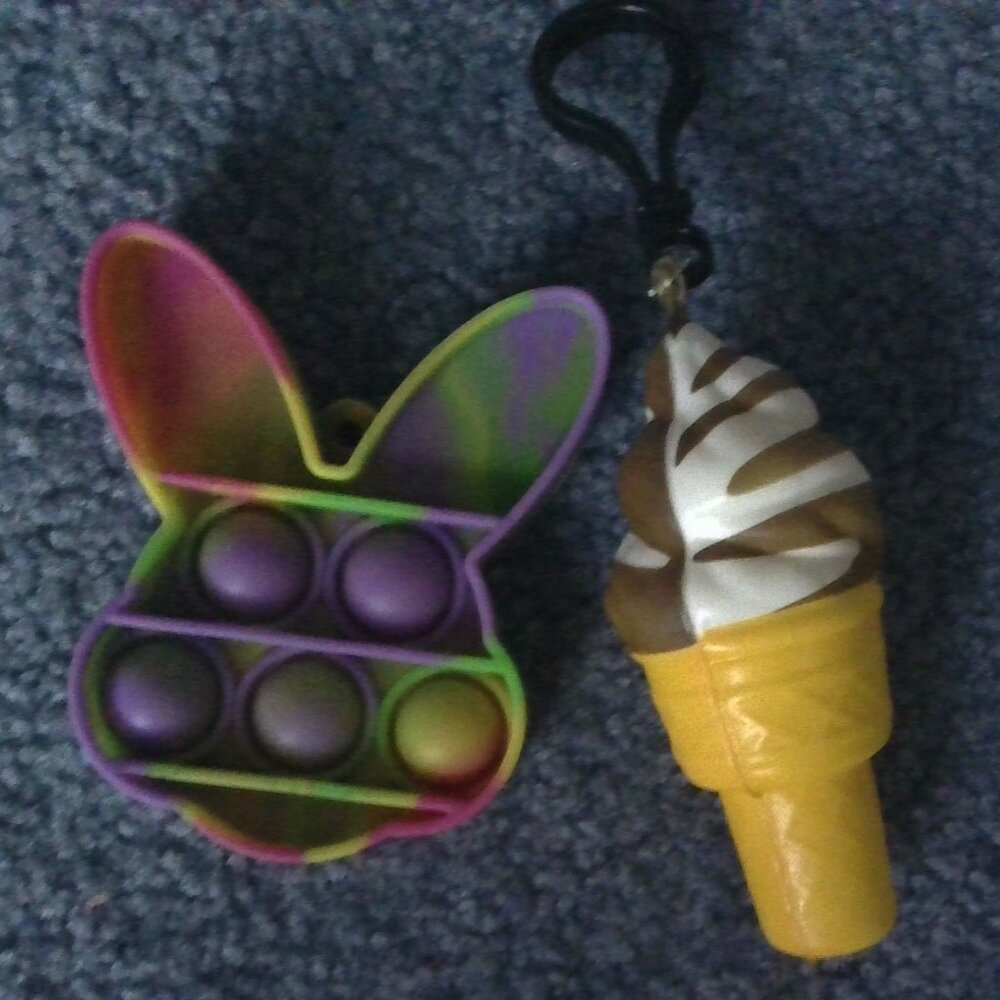 Easter poppit keychain w/ ice cream squishy keychain.